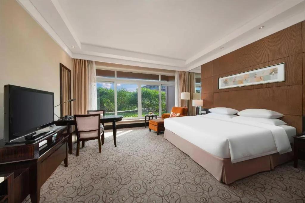 Bed in New Century Grand Hotel Xuzhou