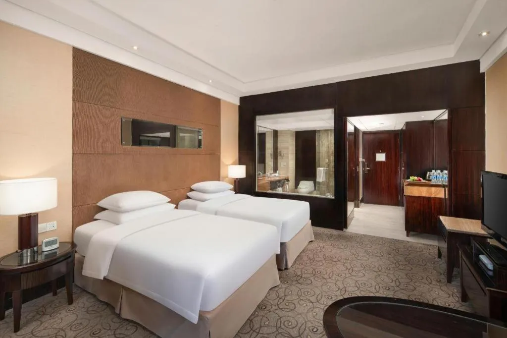 Bed in New Century Grand Hotel Xuzhou