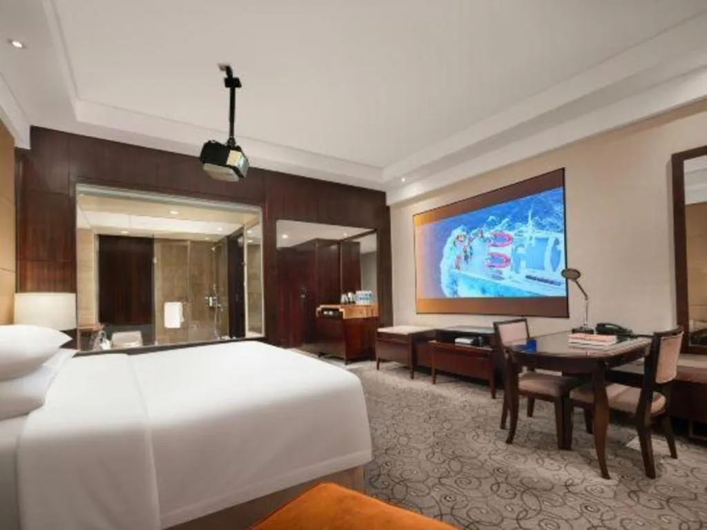Bed in New Century Grand Hotel Xuzhou