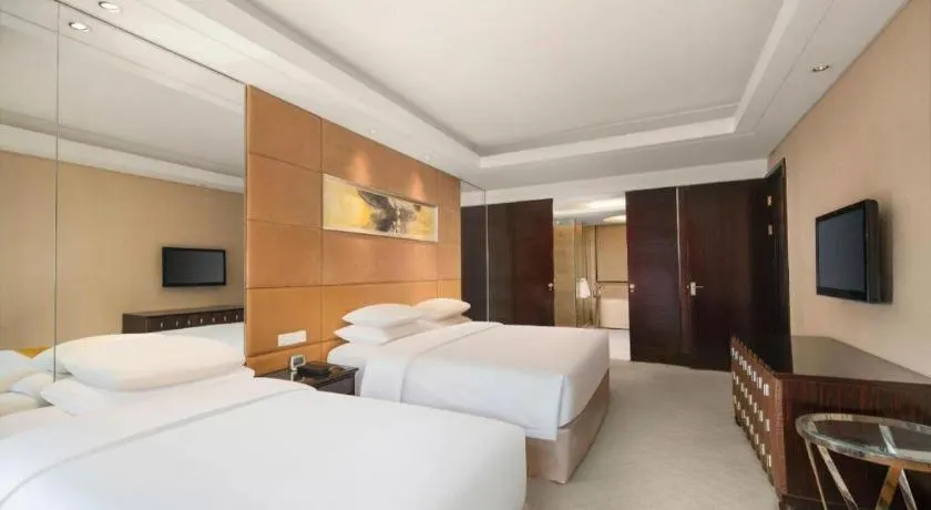 Bed in New Century Grand Hotel Xuzhou