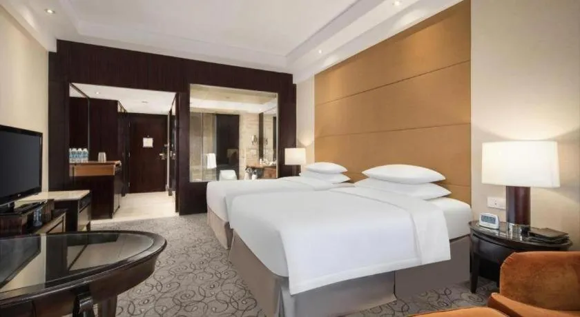 Bed in New Century Grand Hotel Xuzhou