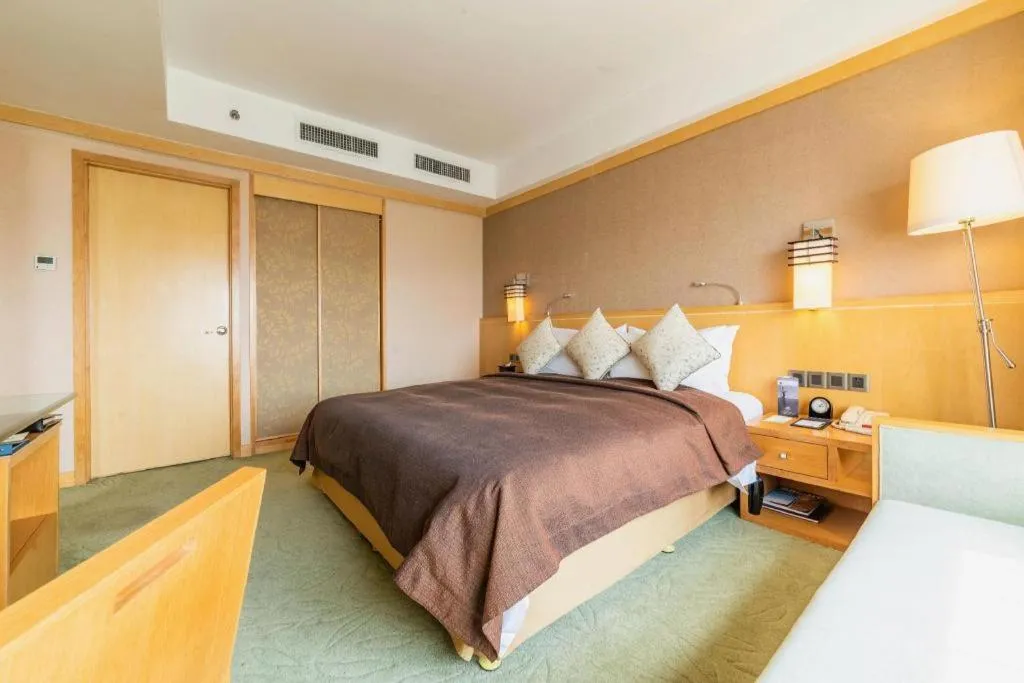 Bed in Xian Grand Noble Hotel