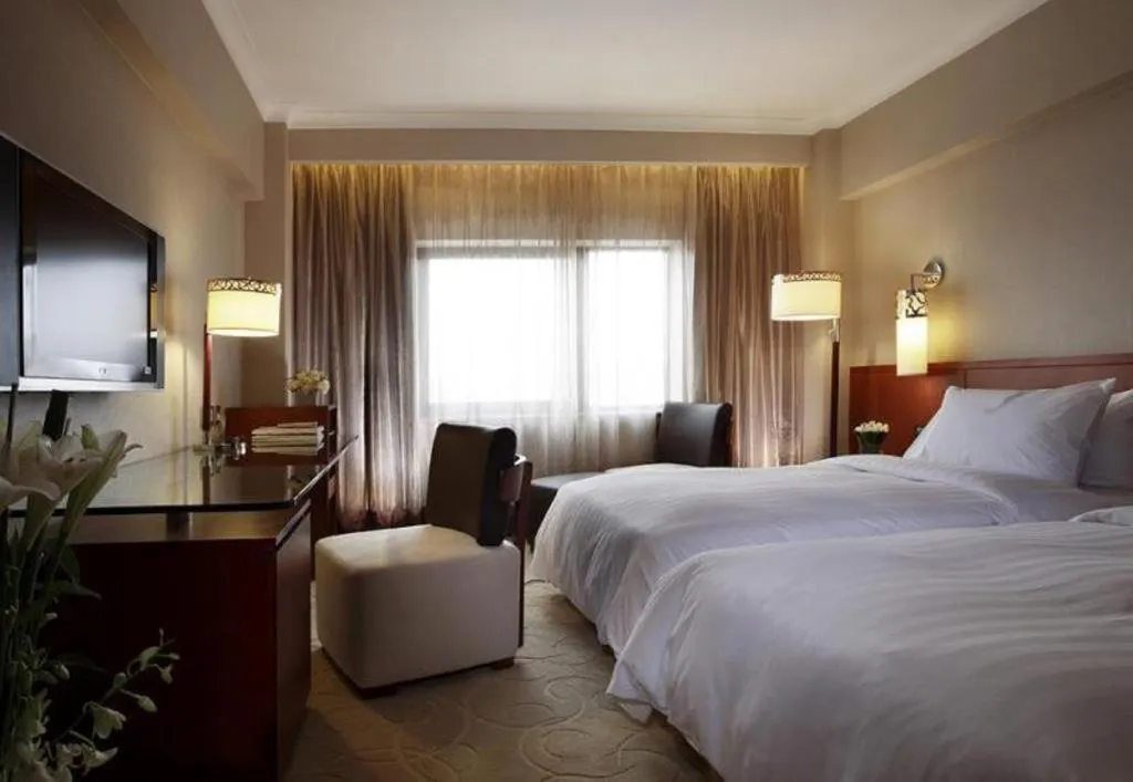 Bed in Xian Grand Noble Hotel