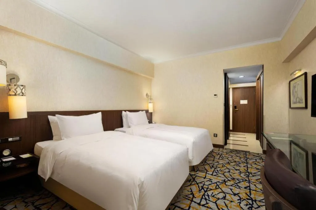 Bed in Xian Grand Noble Hotel