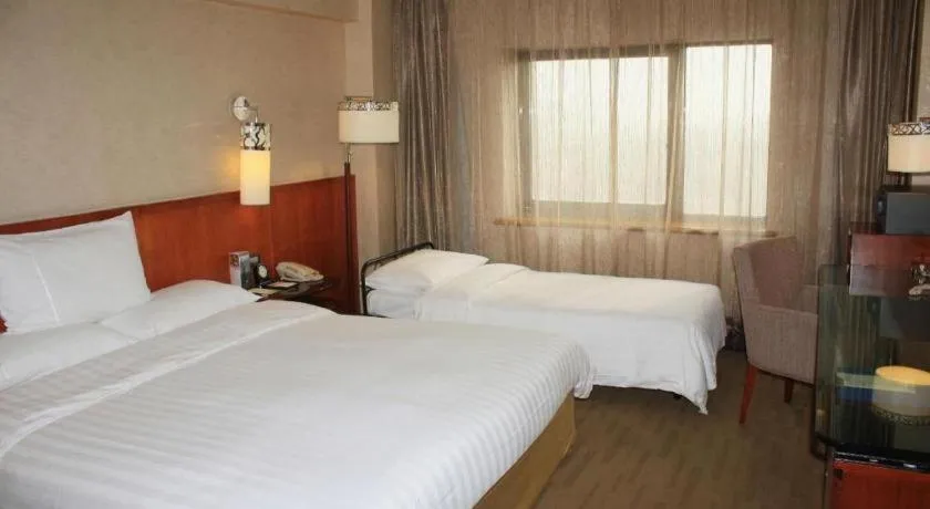 Bed in Xian Grand Noble Hotel