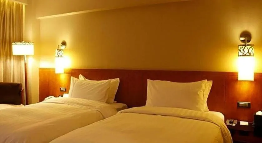 Bed in Xian Grand Noble Hotel