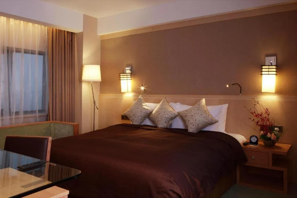 Bed in Xian Grand Noble Hotel