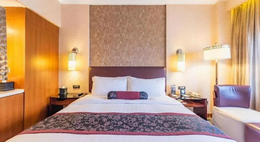 Bed in Xian Grand Noble Hotel