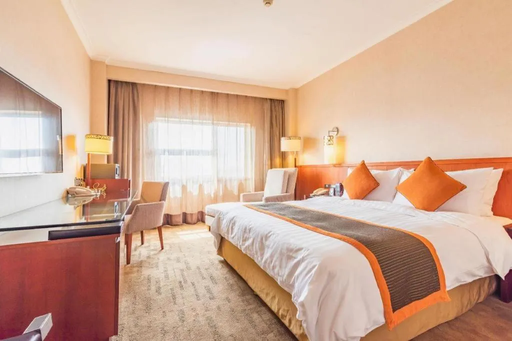 Bed in Xian Grand Noble Hotel