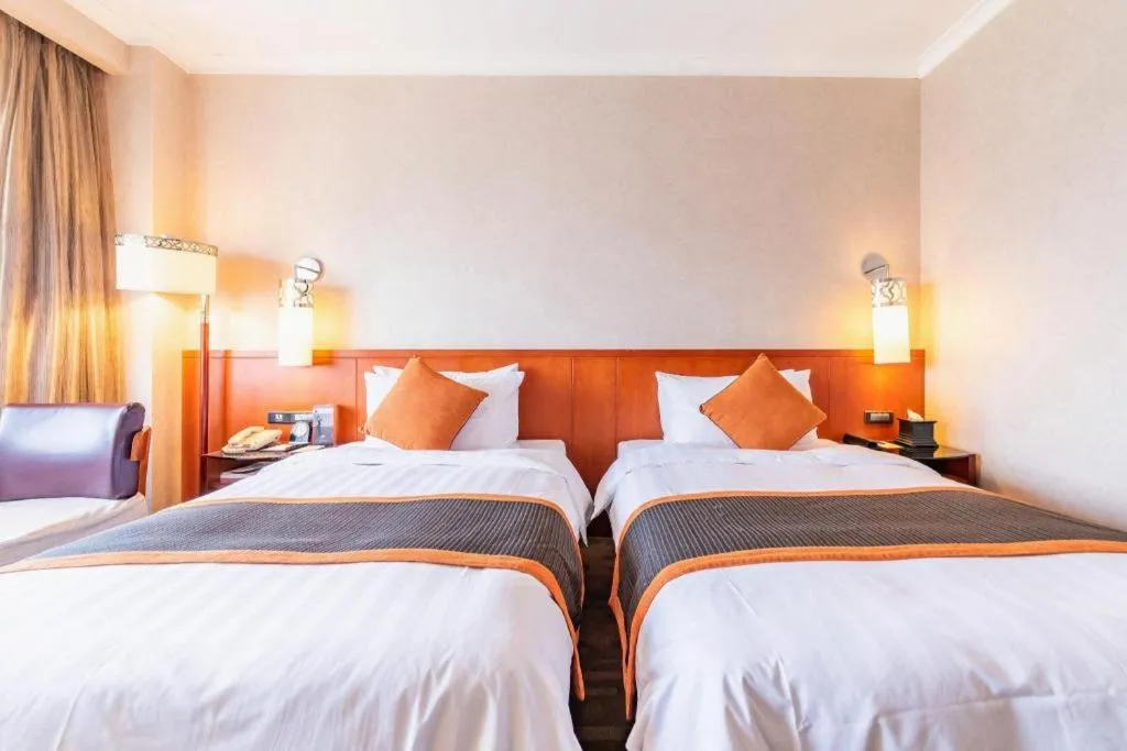 Bed in Xian Grand Noble Hotel