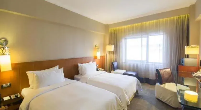 Bed in Xian Grand Noble Hotel Bed in Xian Grand Noble Hotel