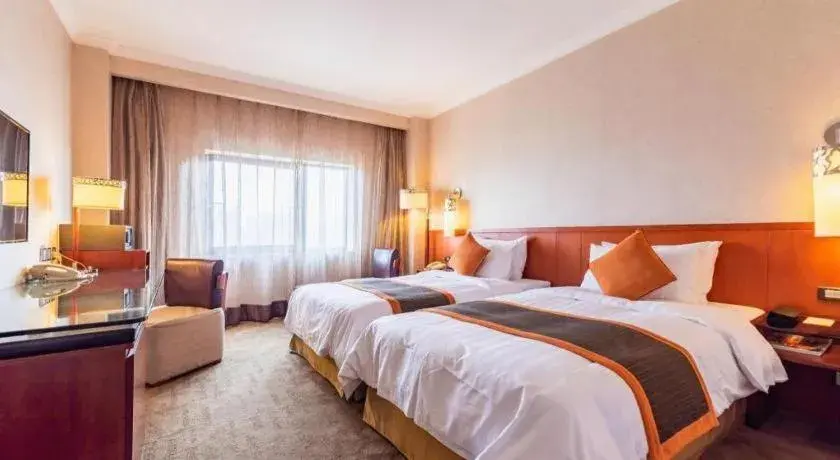 Bed in Xian Grand Noble Hotel Bed in Xian Grand Noble Hotel