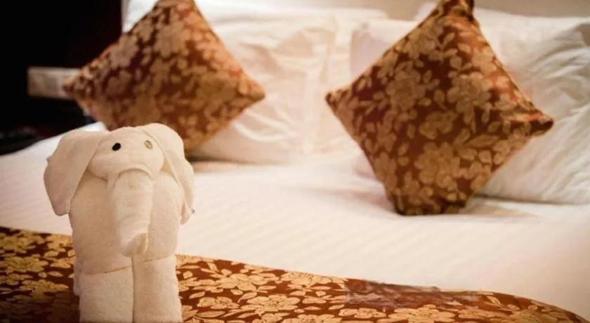 Bed in New Century Hotel Zaozhuang Fengming