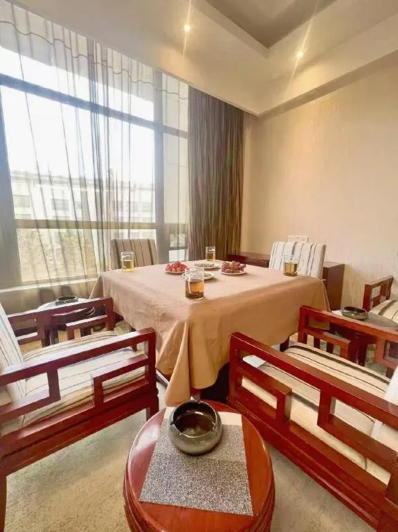 Bed in New Century Hotel Zaozhuang Fengming