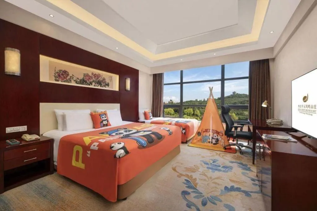 Bed in New Century Hotel Zaozhuang Fengming