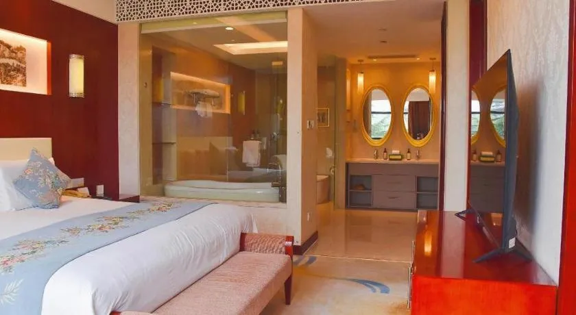 Bed in New Century Hotel Zaozhuang Fengming