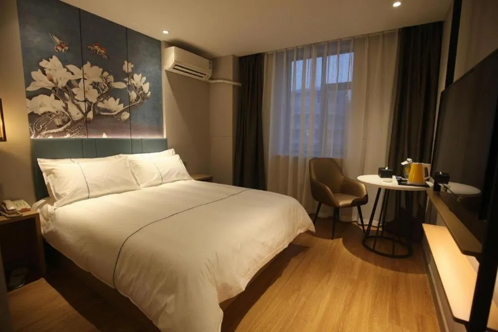 Bed in Magnotel Business Xuzhou Jinying Sudi Road Metro Station
