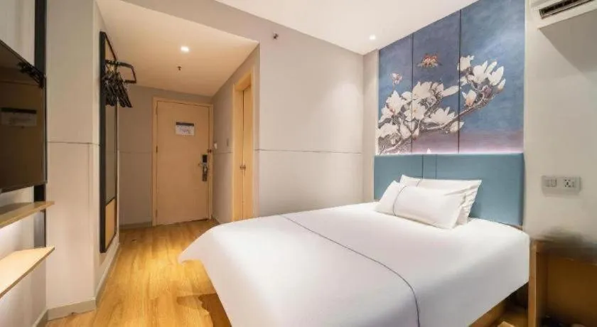 Bed in Magnotel Business Xuzhou Jinying Sudi Road Metro Station