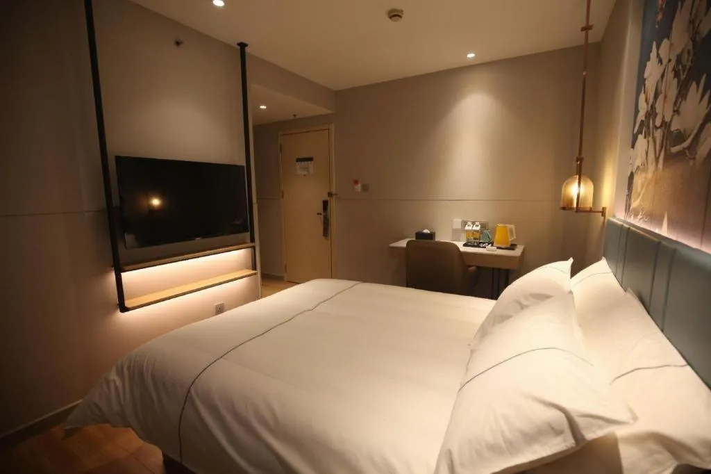 Bed in Magnotel Business Xuzhou Jinying Sudi Road Metro Station