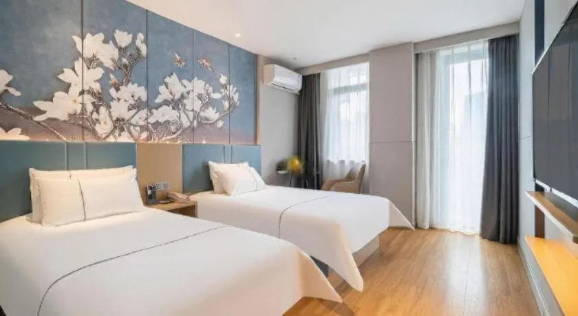 Bed in Magnotel Business Xuzhou Jinying Sudi Road Metro Station