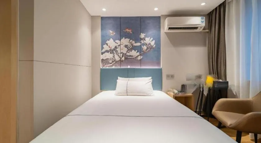 Bed in Magnotel Business Xuzhou Jinying Sudi Road Metro Station