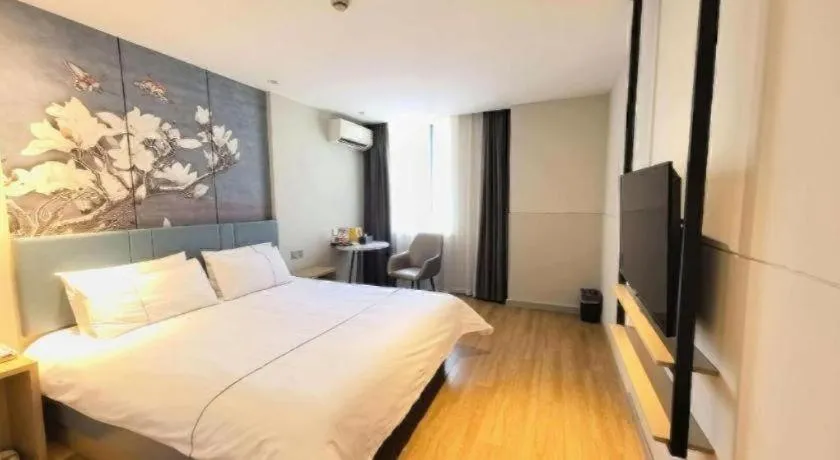 Bed in Magnotel Business Xuzhou Jinying Sudi Road Metro Station
