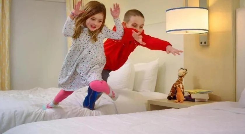 Bed in Sonesta ES Suites Ann Arbor