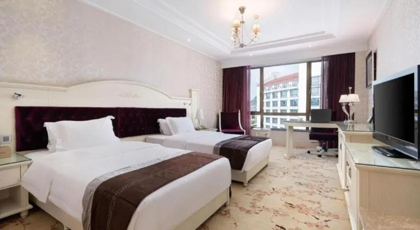 Bed in Guilin Bravo Hotel Grand Wing