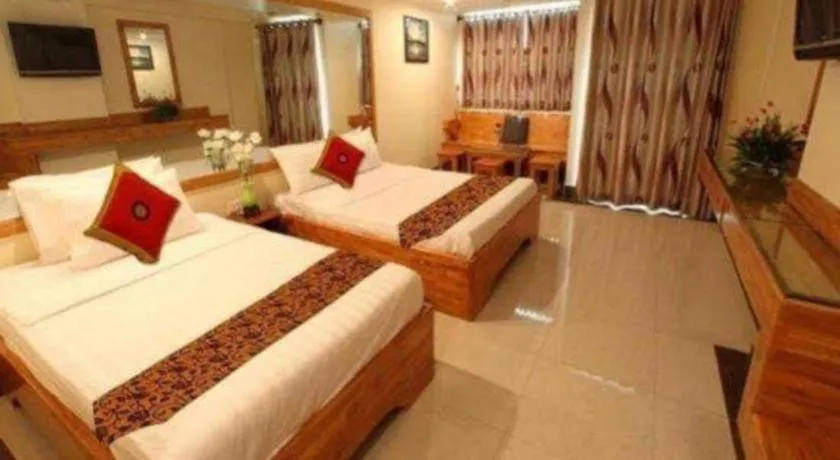 Bed in Lucky Star Hotel