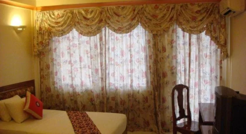 Bed in Lucky Star Hotel