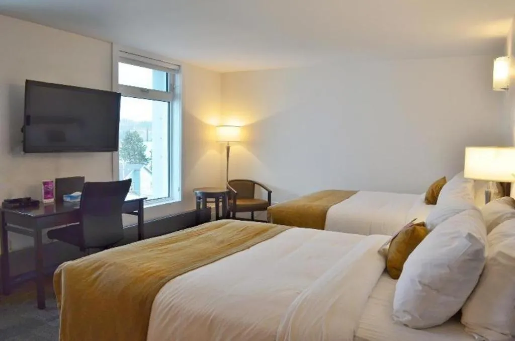 Bed in Coast High Country Inn