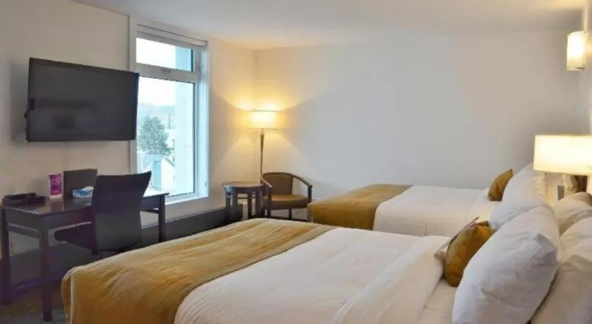 Bed in Coast High Country Inn