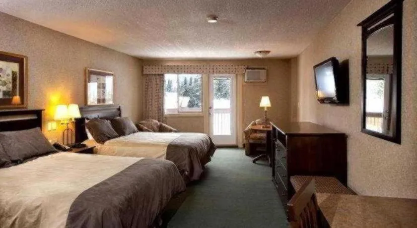 Bed in Coast High Country Inn