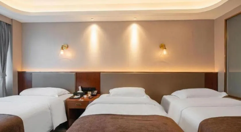 Bed in Guilin Plaza Hotel
