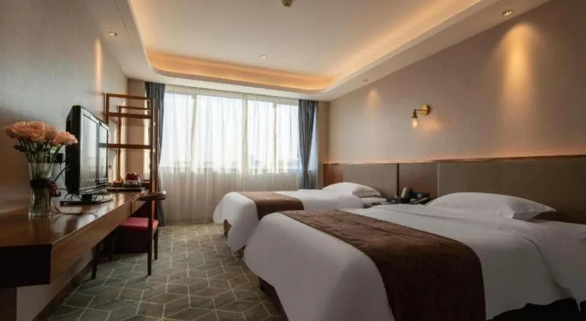 Bed in Guilin Plaza Hotel