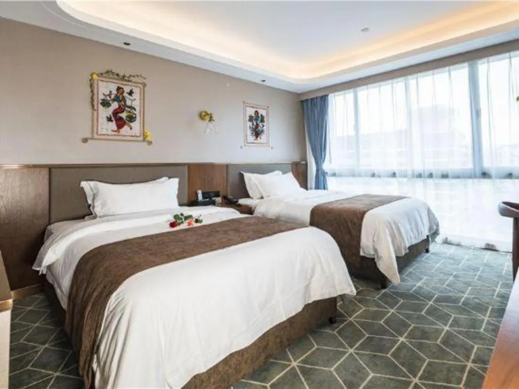 Bed in Guilin Plaza Hotel