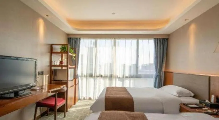 Bed in Guilin Plaza Hotel
