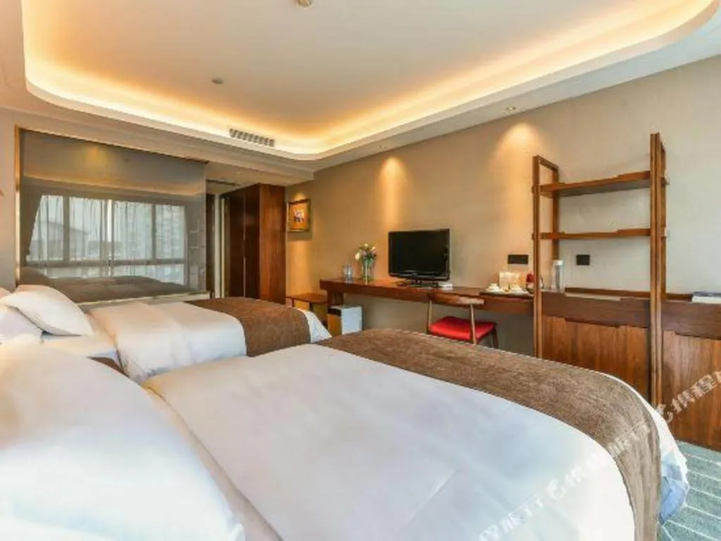 Bed in Guilin Plaza Hotel