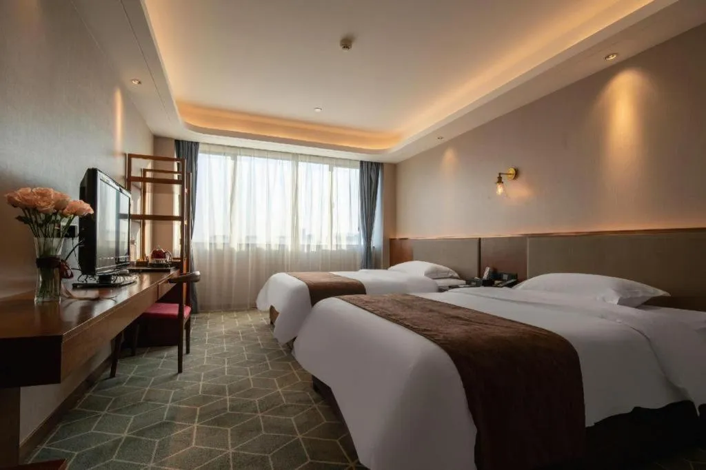 Bed in Guilin Plaza Hotel