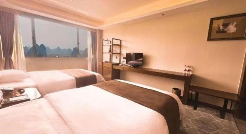 Bed in Guilin Plaza Hotel