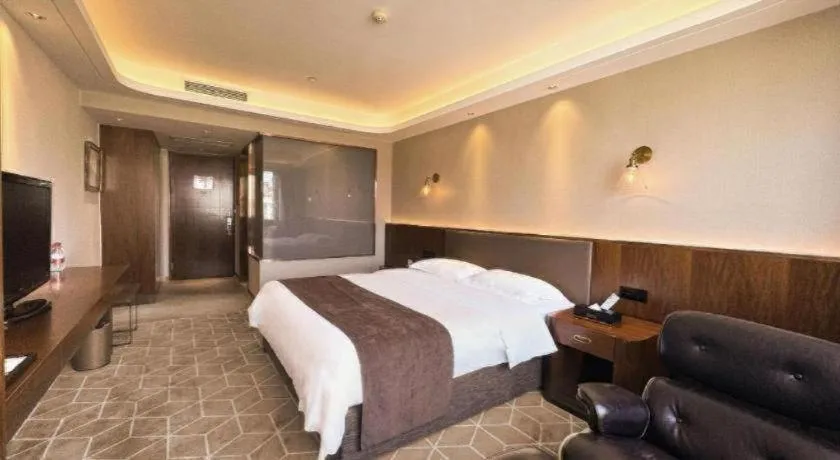 Bed in Guilin Plaza Hotel