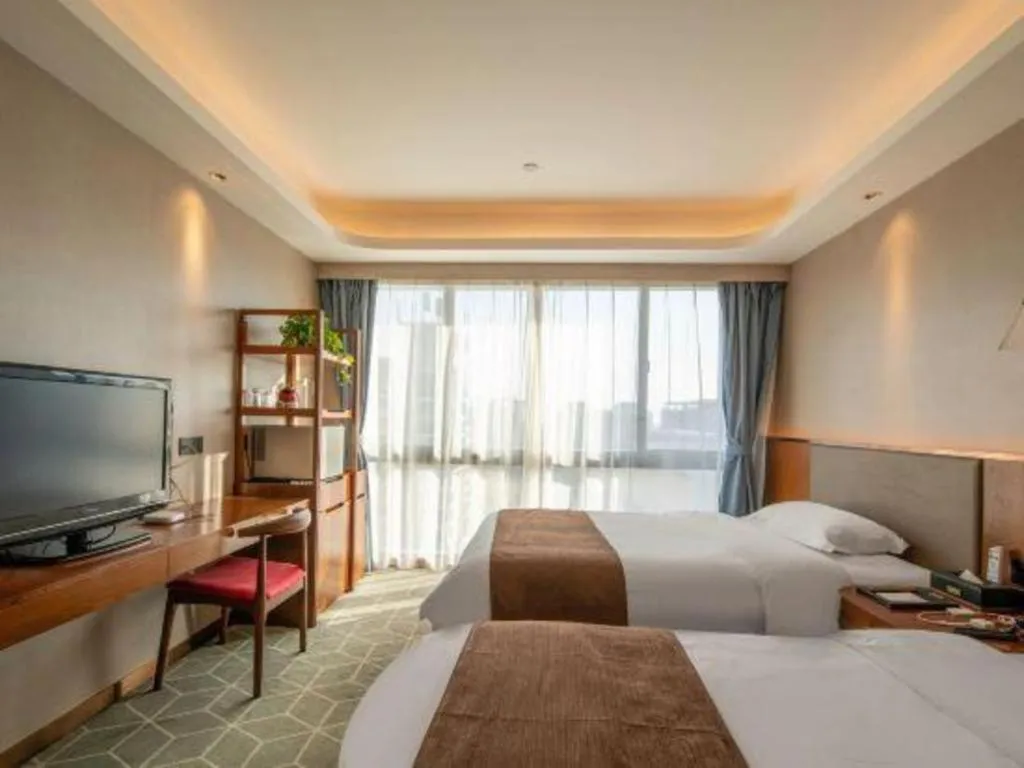 Bed in Guilin Plaza Hotel