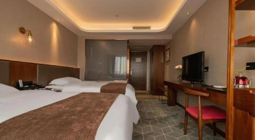 Bed in Guilin Plaza Hotel