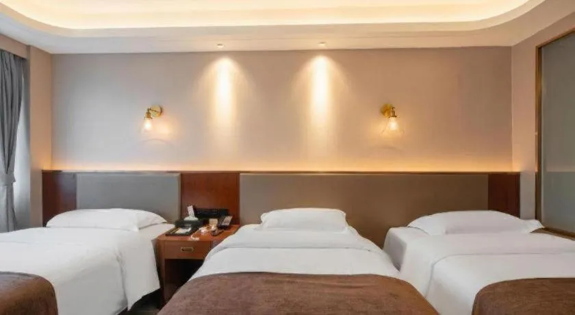 Bed in Guilin Plaza Hotel