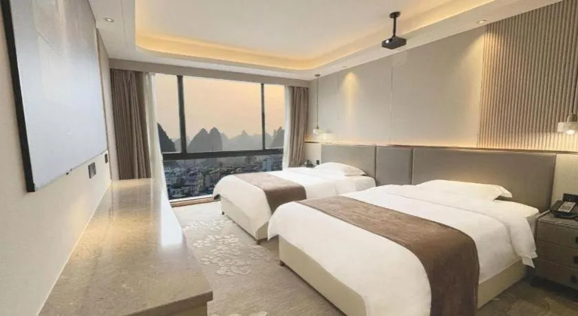 Bed in Guilin Plaza Hotel