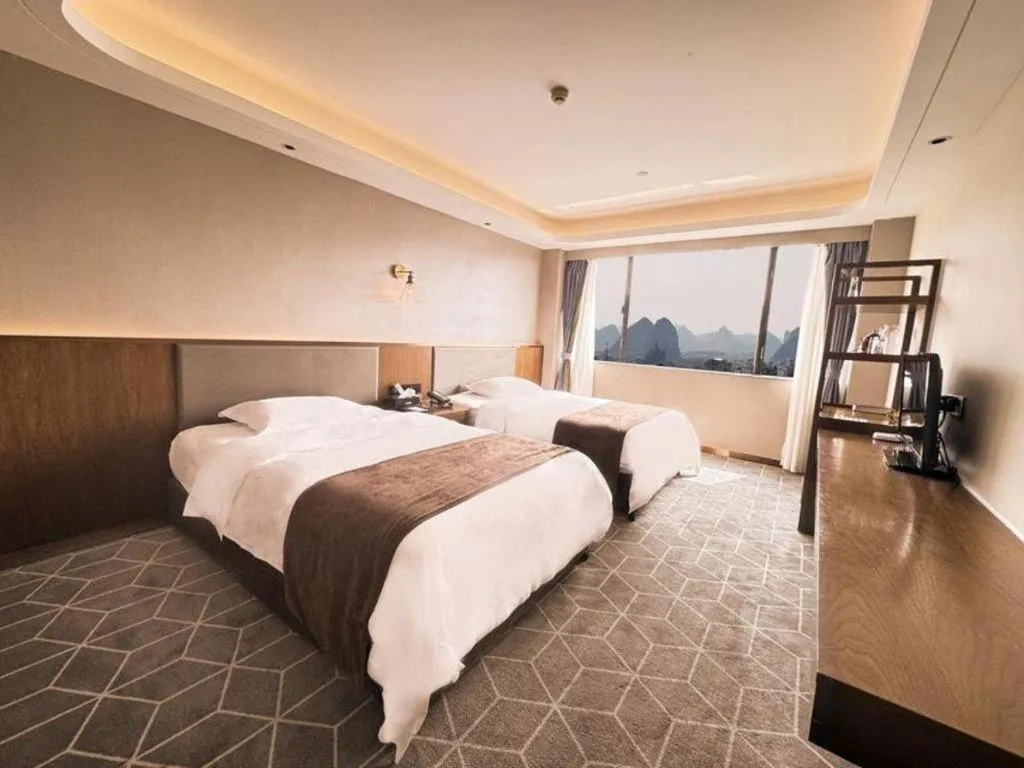 Bed in Guilin Plaza Hotel