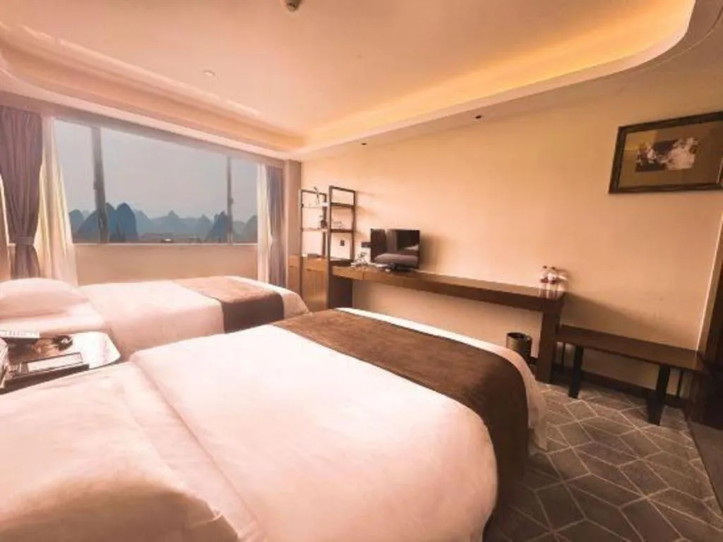 Bed in Guilin Plaza Hotel