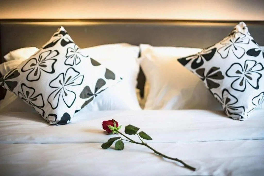 Bed in Guilin Plaza Hotel