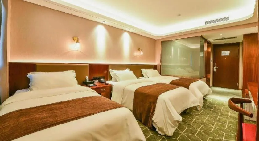 Bed in Guilin Plaza Hotel