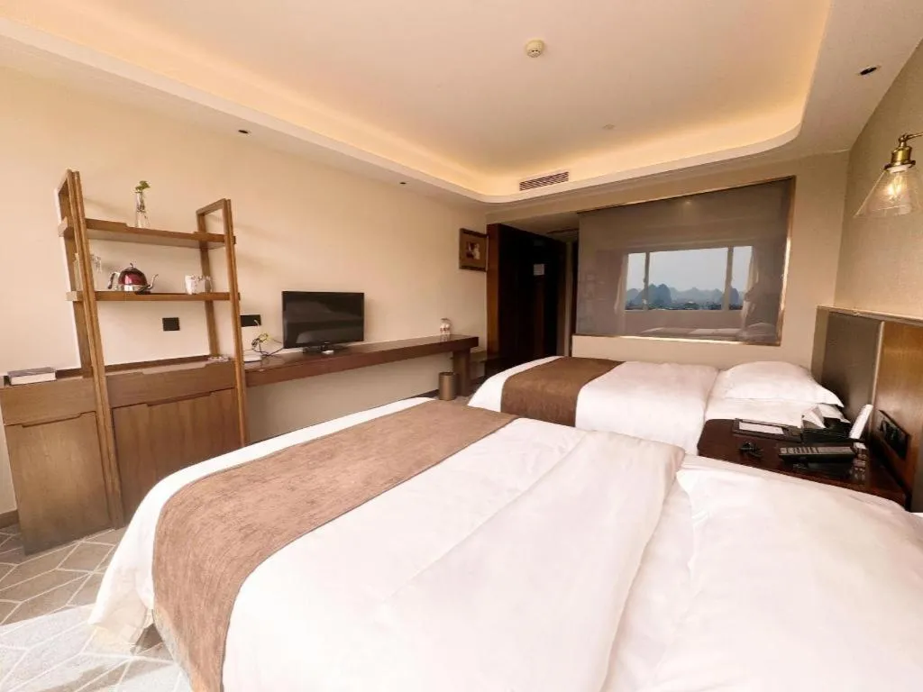 Bed in Guilin Plaza Hotel